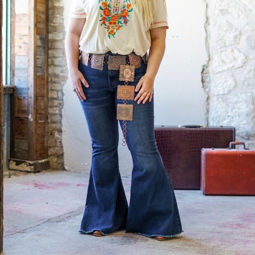 Mid rise flare denim in dark wash.